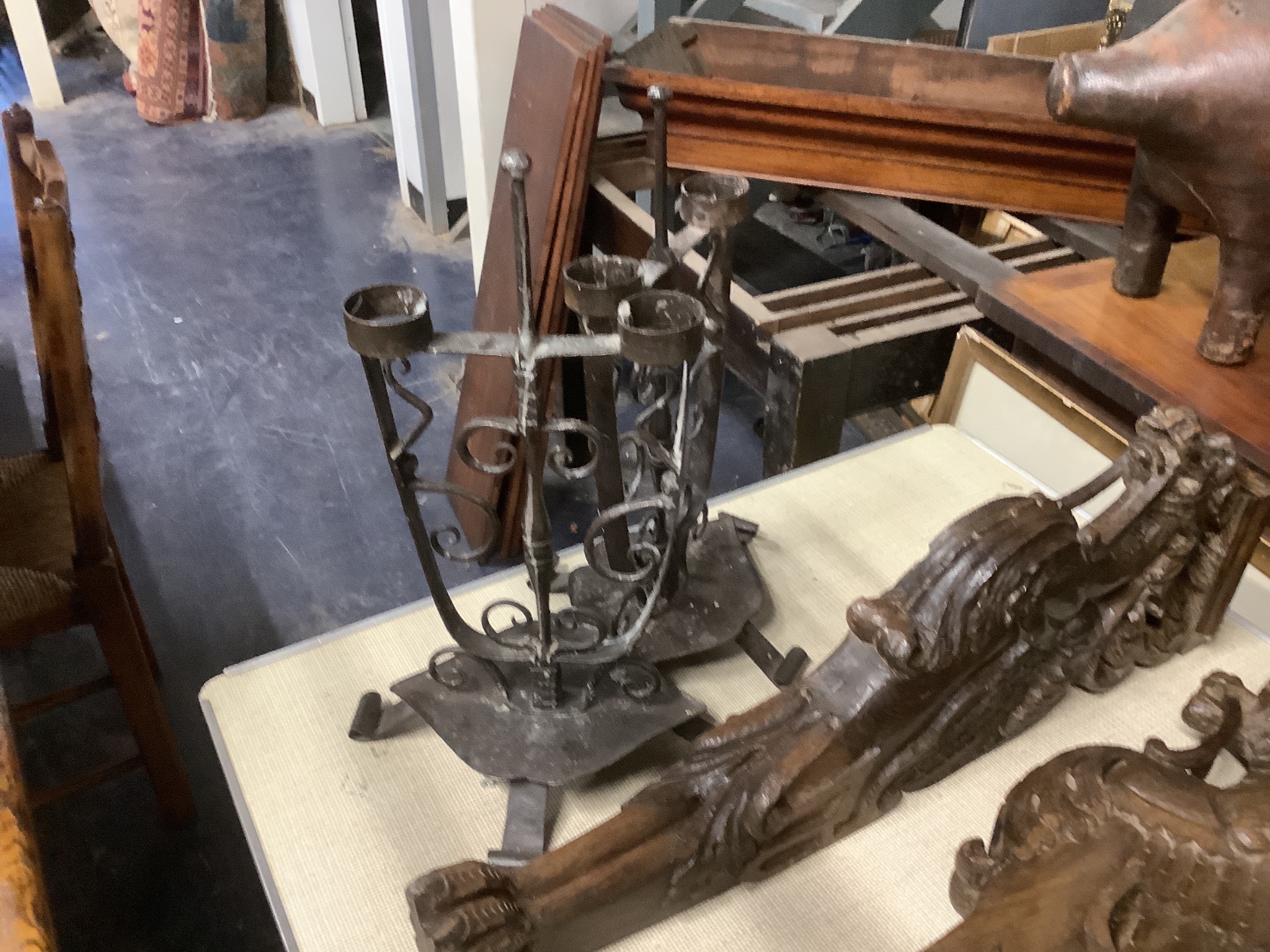 A pair of wrought iron candelabra, height 44.5cm